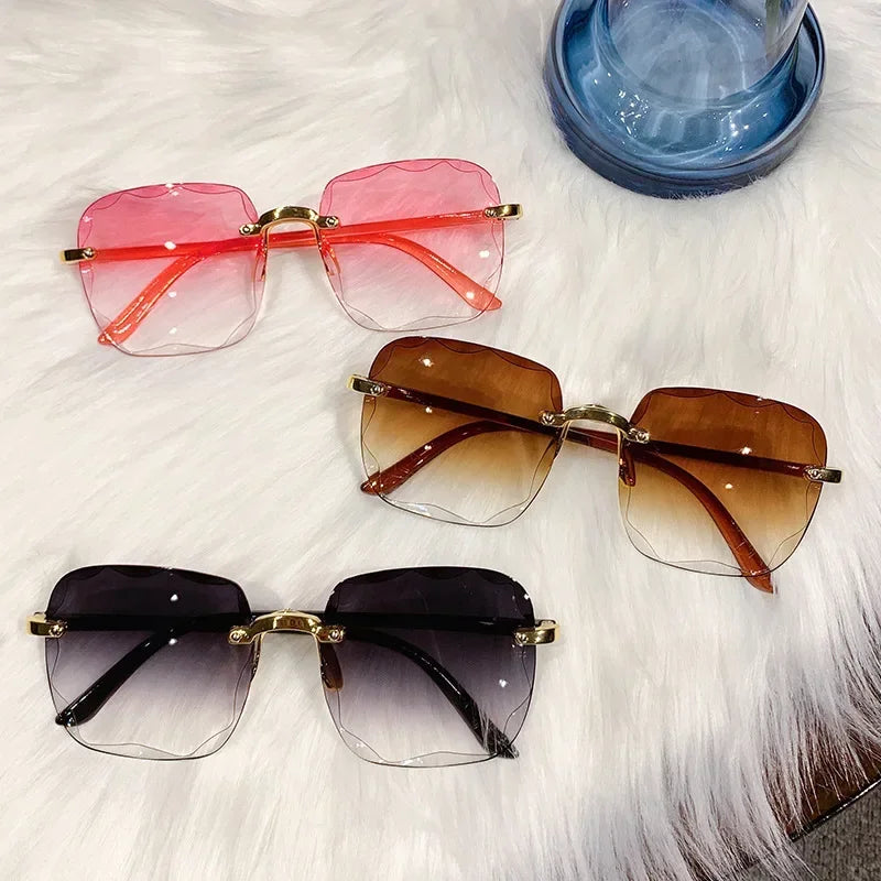 2024 New Rimless Women's Sunglasses Fashion Gradient Lenses Sun glasses Lady Vintage Alloy Legs Classic Designer Shades UV400