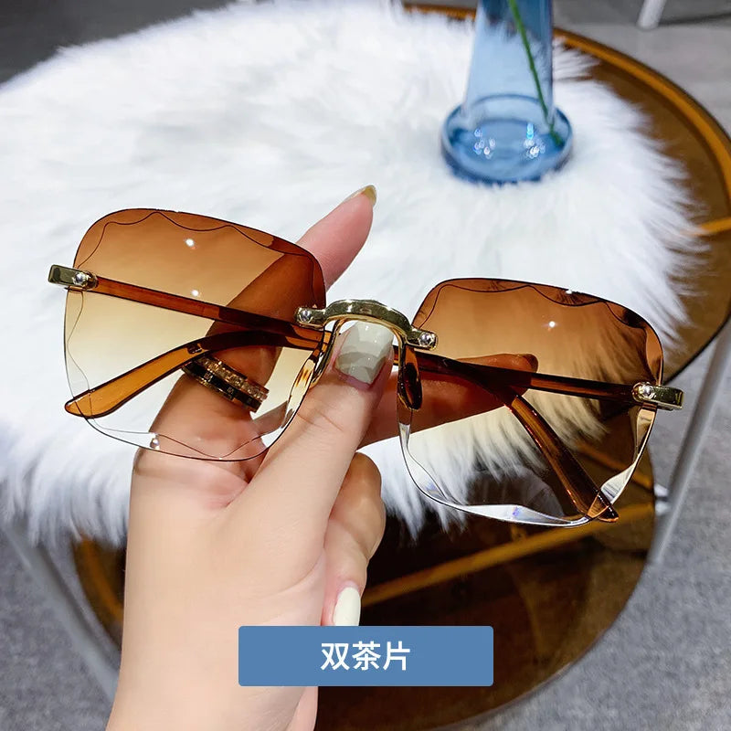 2024 New Rimless Women's Sunglasses Fashion Gradient Lenses Sun glasses Lady Vintage Alloy Legs Classic Designer Shades UV400